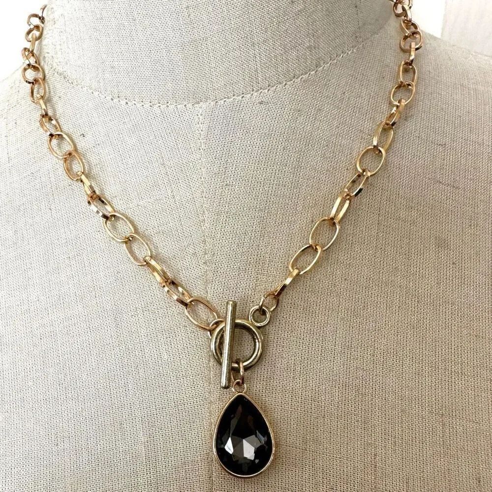 Gold tone grey rhinestone teardrop pendant necklace